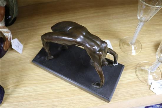 A bronze figure of an acrobat, signed Milo length 25cm